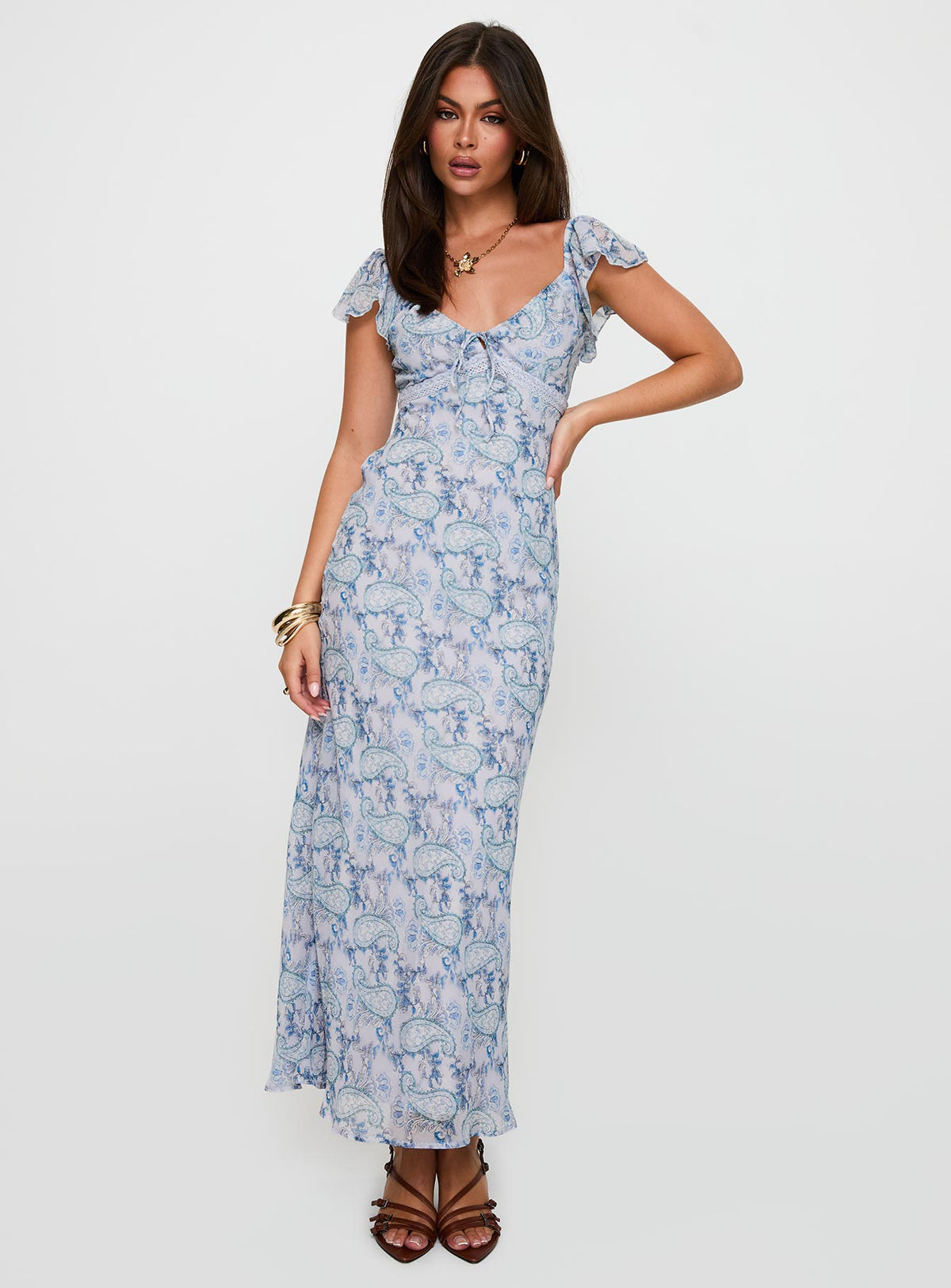 front view of model wearing Princess Polly Dahleia Maxi Dress Blue Paisley V-Neck 