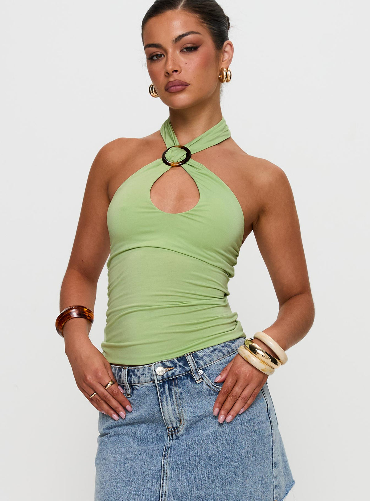 front view of model wearing Princess Polly Quell Top Green Sleeveless High Neck 