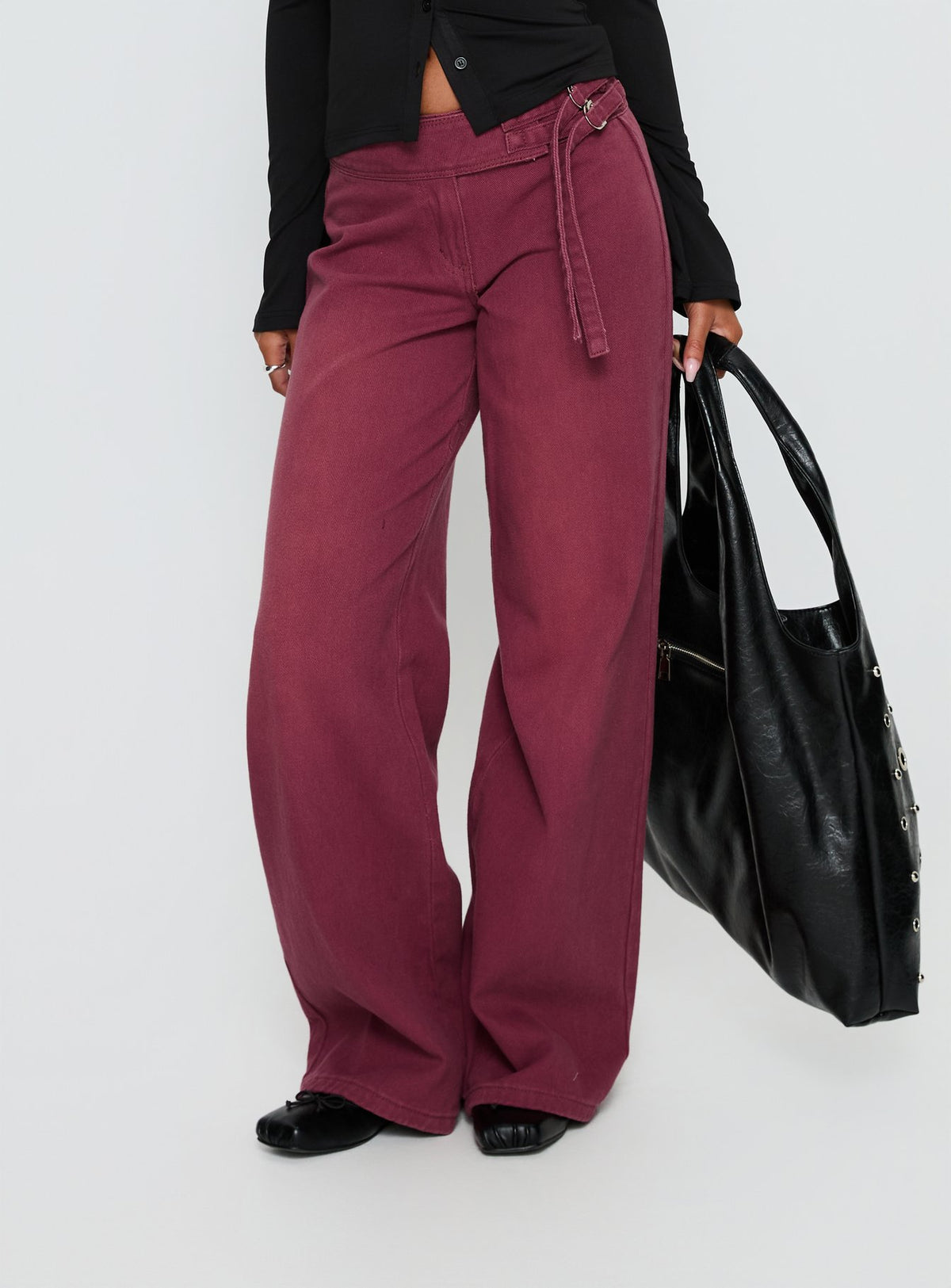 side view of model wearing Princess Polly Boxie Mid Rise Wide Leg Jeans Washed Burgundy Mid Rise Jeans Jeans 