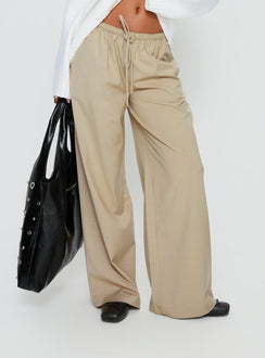 side view of model wearing Princess Polly Ketrina Tie Waist Pants Beige Plaid Mid Rise Pants Pants 