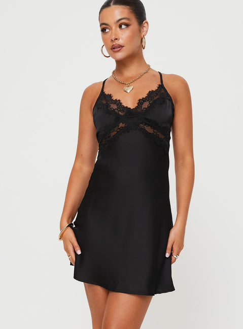 Front view of model wearing  front Princess Polly Sweetheart Neckline  Treasure Mini Dress Black