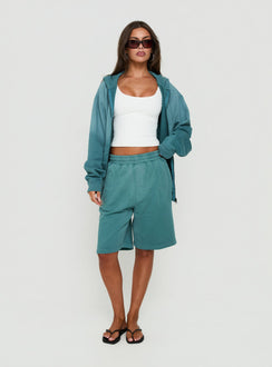 Style the AT Fleece Baggy Jort in Washed Teal womens regular pants with mid-rise front view of model wearing Princess Polly