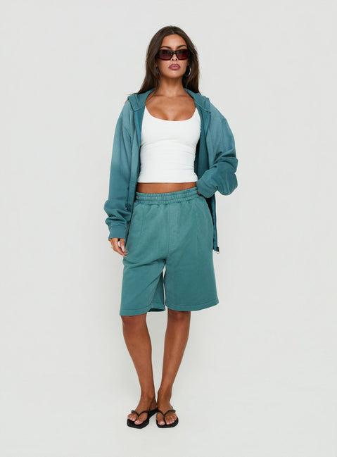 Style the AT Fleece Baggy Jort in Washed Teal womens regular pants with mid-rise front view of model wearing Princess Polly