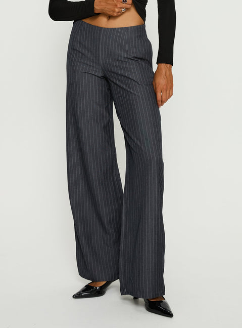 back view of model wearing Princess Polly Khane Low Rise Wide Leg Pant Charcoal Pinstripe Mid Rise Pants Pants 