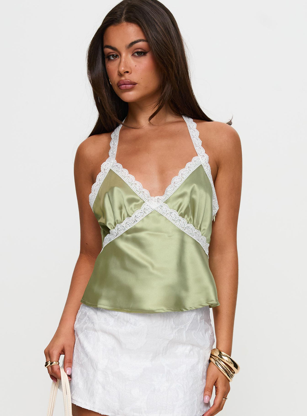 front view of model wearing Princess Polly Bimbette Halter Cami Top Green Sleeveless Plunger 