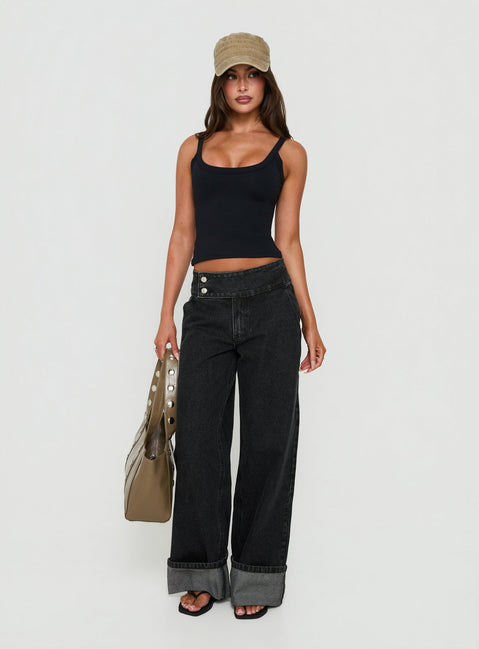 Introducing the Nikoletta Foldover Jeans Washed Black with high-rise wide-leg fit front view of model wearing Princess Polly