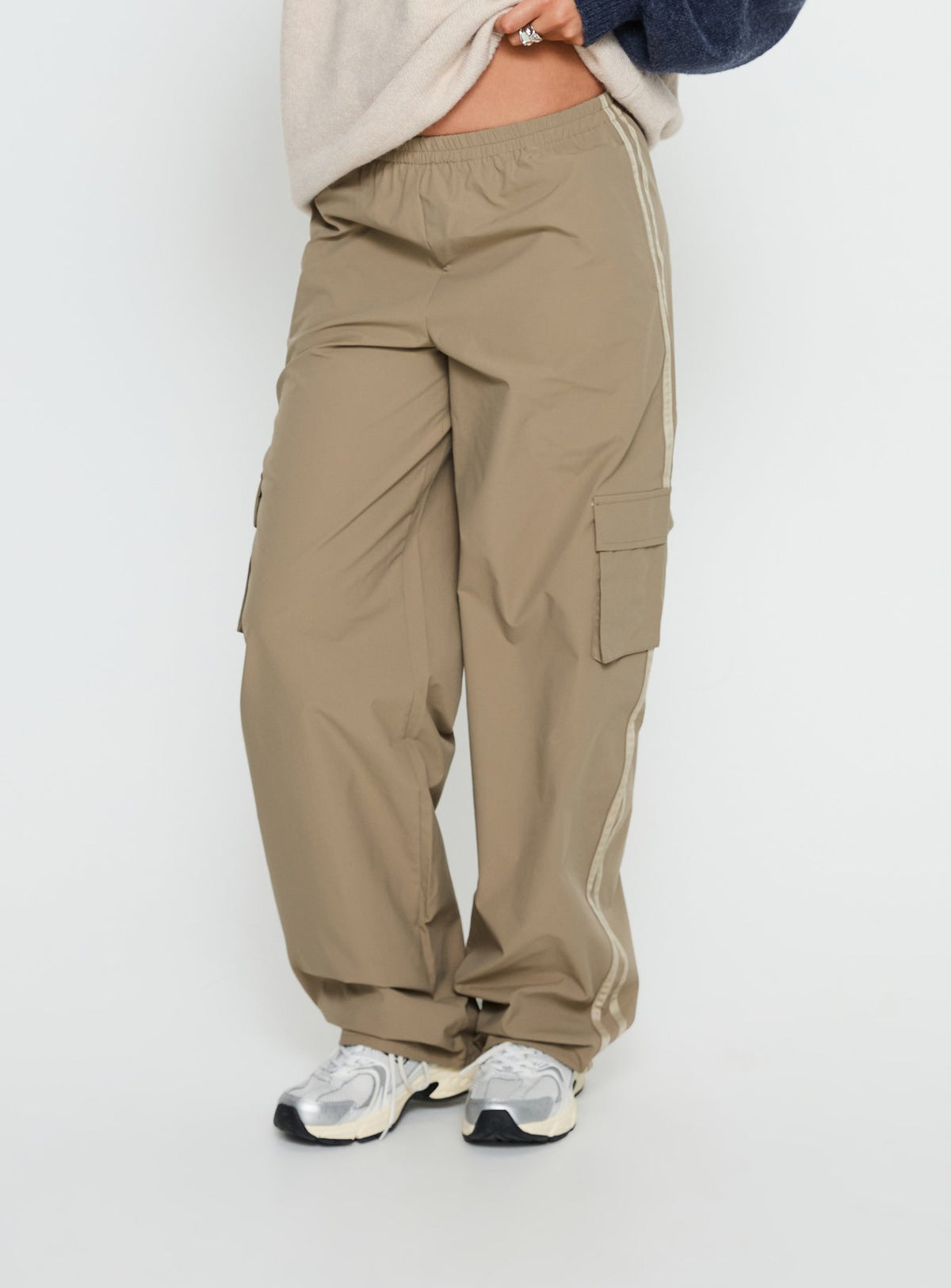 back view of model wearing Princess Polly Ellyn Baggy Cargo Pants Khaki Mid Rise Pants Pants 