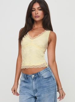 back view of model wearing Princess Polly Far Away Top Yellow Sleeveless Plunger 