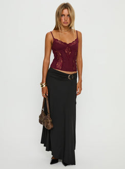   side view of model wearing Princess Polly Nola Hardware Slit Maxi Skirt Black Skirts 