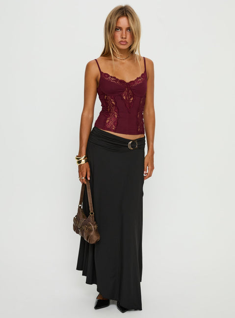   side view of model wearing Princess Polly Nola Hardware Slit Maxi Skirt Black Skirts 
