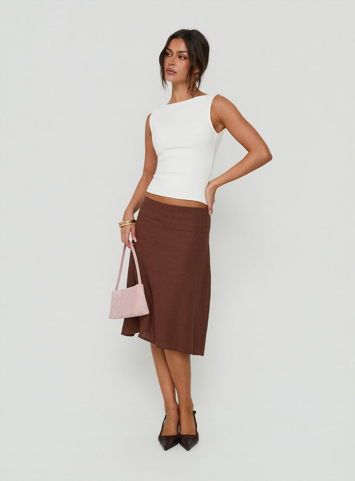 Discover the Such Delight Linen Midi Skirt Chocolate womens-skirts side view of model wearing Princess Polly