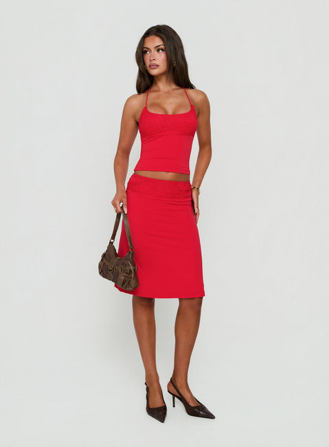 Showcasing the Zenaide Lace Detail Midi Skirt Red in womens-skirts front view of model wearing
