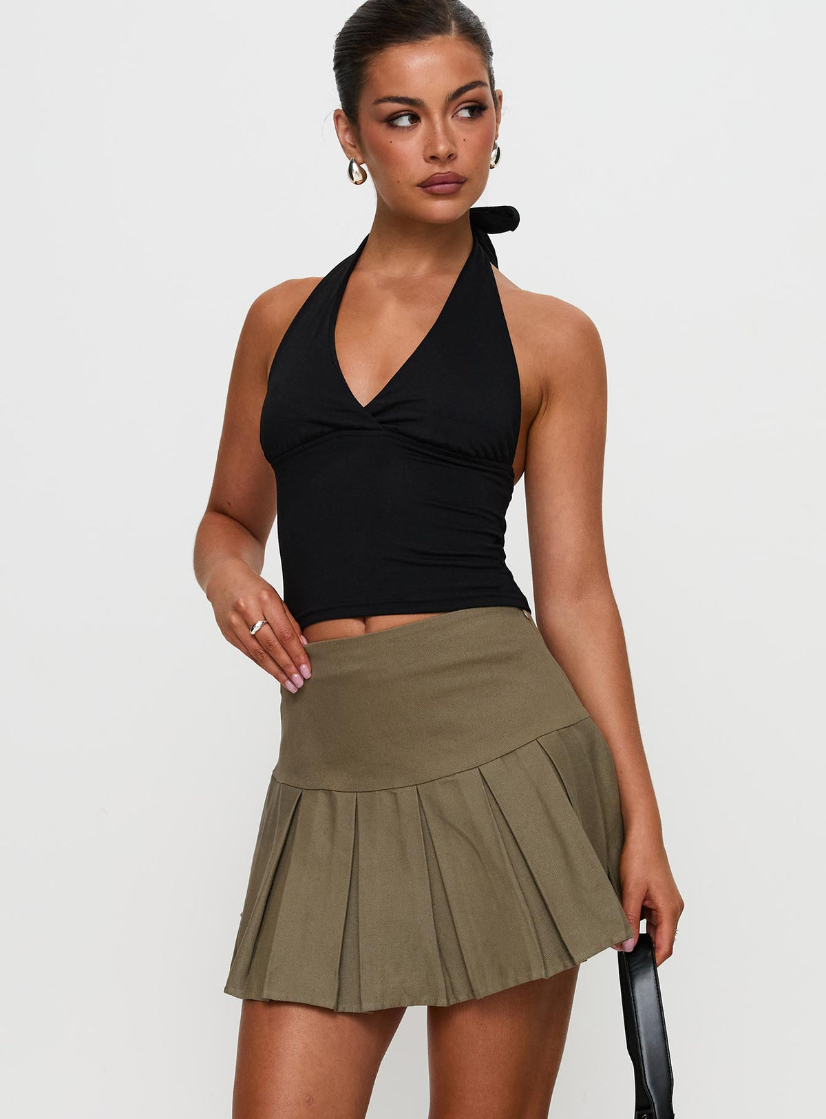   front view of model wearing Princess Polly Feodora Pleat Mini Skirt Khaki Mini Skirts Skirts 