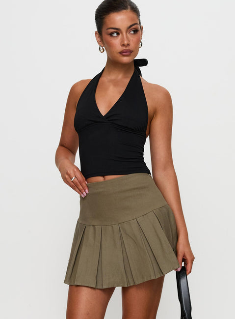   front view of model wearing Princess Polly Feodora Pleat Mini Skirt Khaki Mini Skirts Skirts 