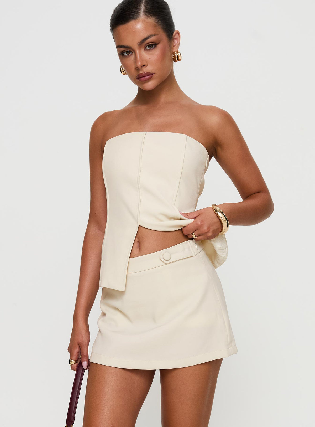 front view of model wearing Princess Polly Full Disclosure Skort Cream High Waisted Shorts 