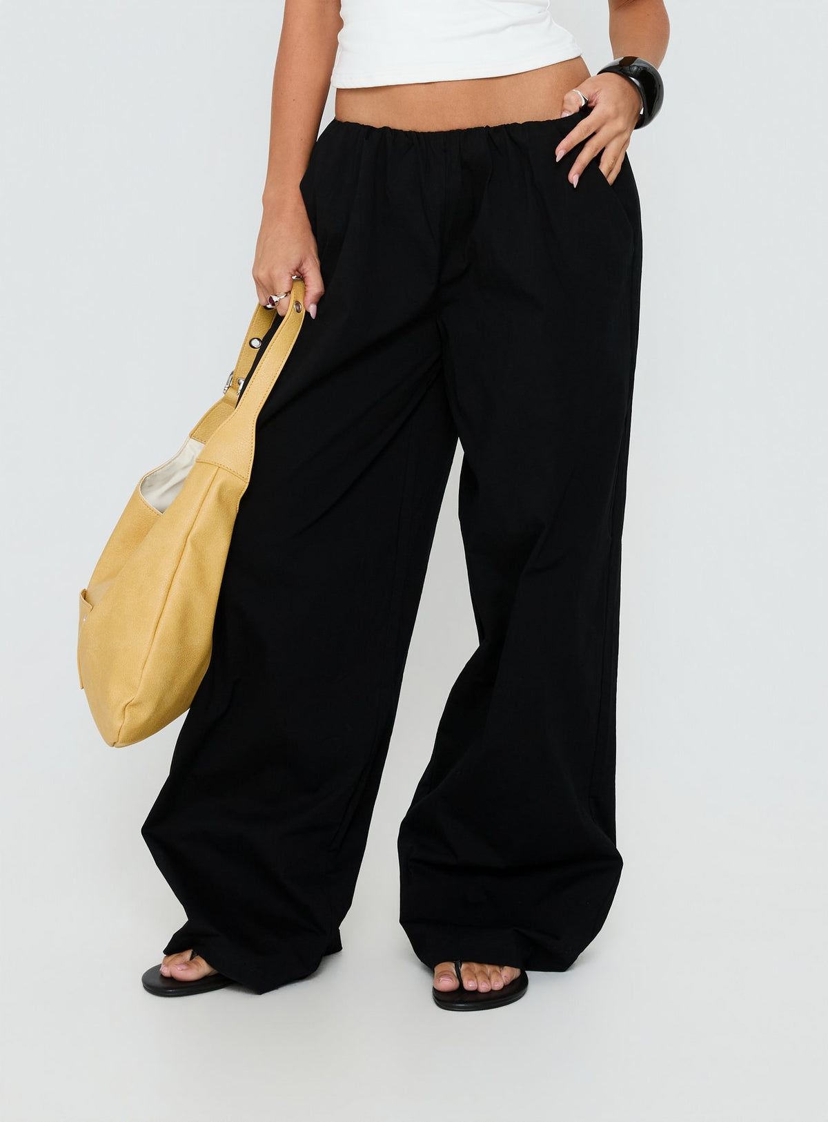 Crafted from Lunea Concealed Waistband Pants Black in womens-regular-pants with high-rise detail view of model wearing Princess Polly