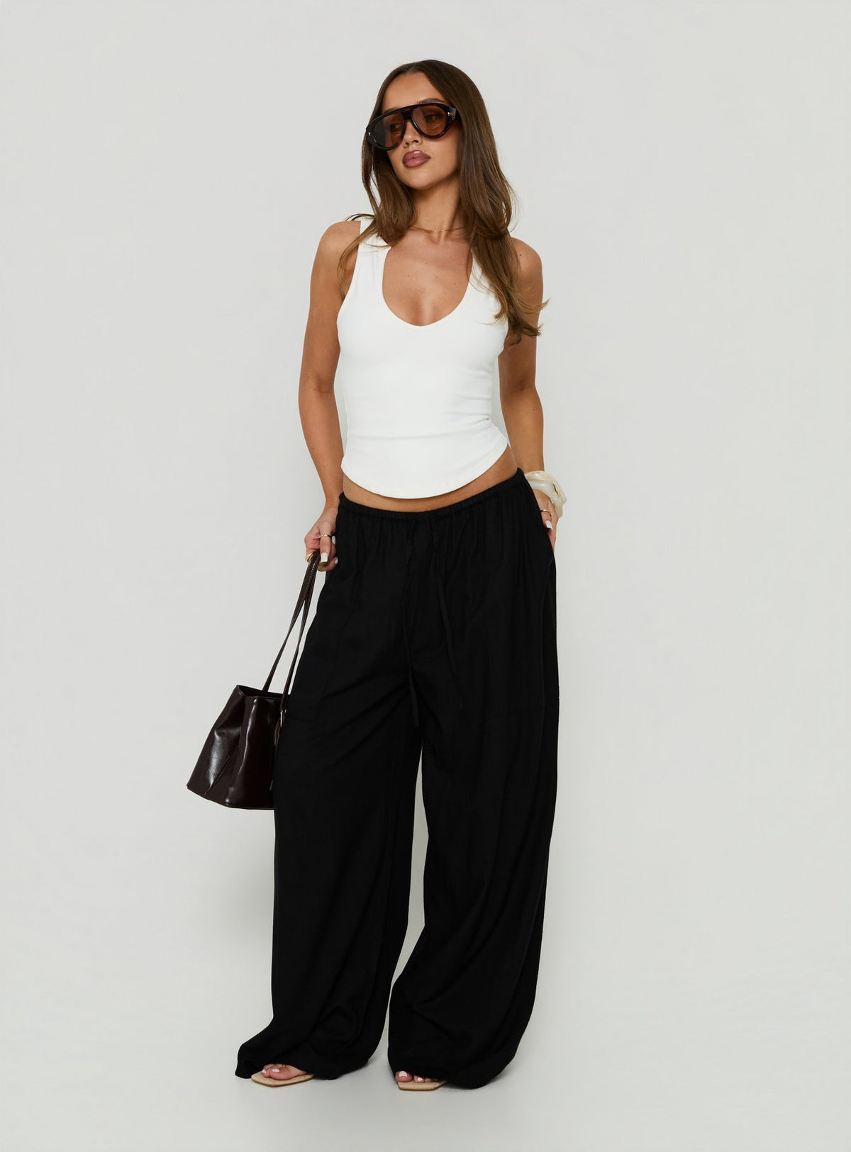 Featuring Peacemaker Tie Waist Relaxed Pants Black womens-regular-pants with mid-rise design product