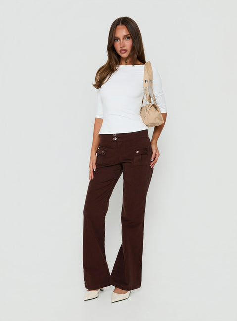 Featuring Vanla Trouser Brown womens-regular-pants with high-rise waist and wide-leg design front view of model wearing Princess Polly