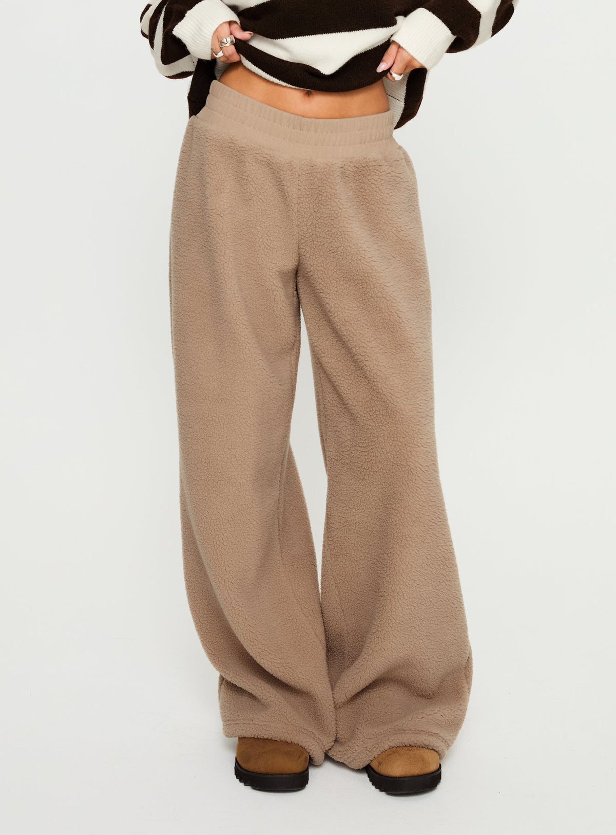 back view of model wearing Princess Polly Siberia Fleece Track Pant Light Brown High Rise Pants Pants 