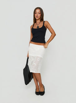 Showcasing the Heart Stealer Sheer Sequin Midi Skirt in White with fitted a-line shape and frayed hem front view of model wearing Princess Polly