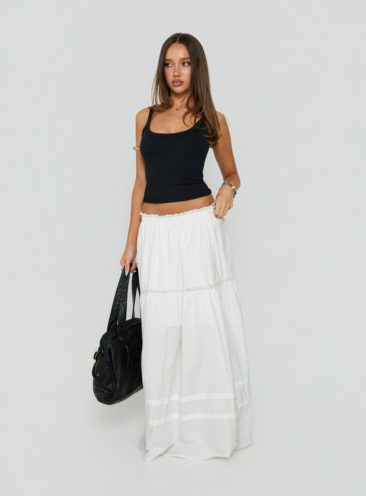 Showcasing the Meanna Tiered Maxi Skirt White in womens-skirts with maxi length front view of model wearing Princess Polly
