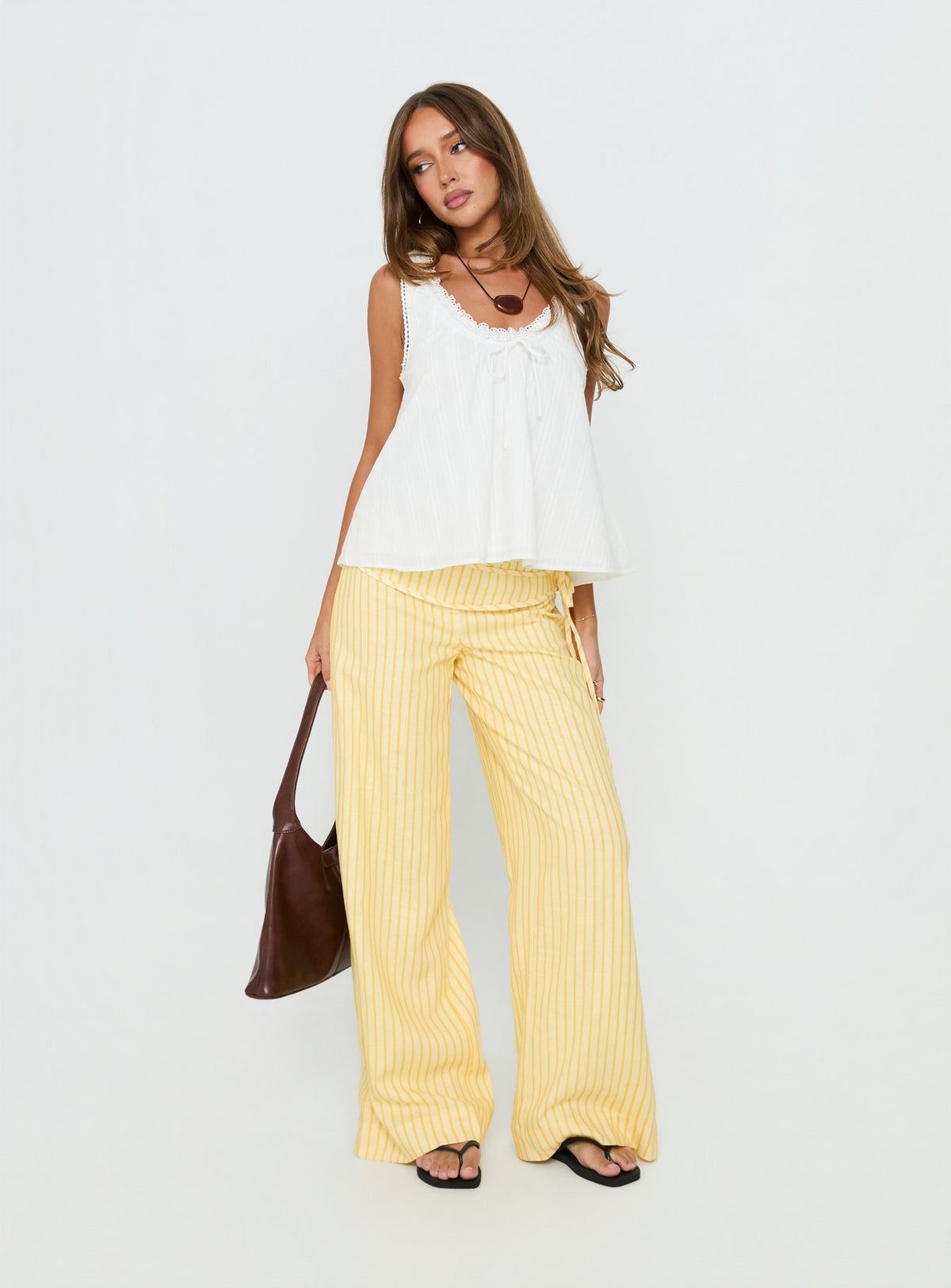 front view of model wearing Princess Polly Silver Moon Pants Yellow Stripe Low Rise Pants Pants 