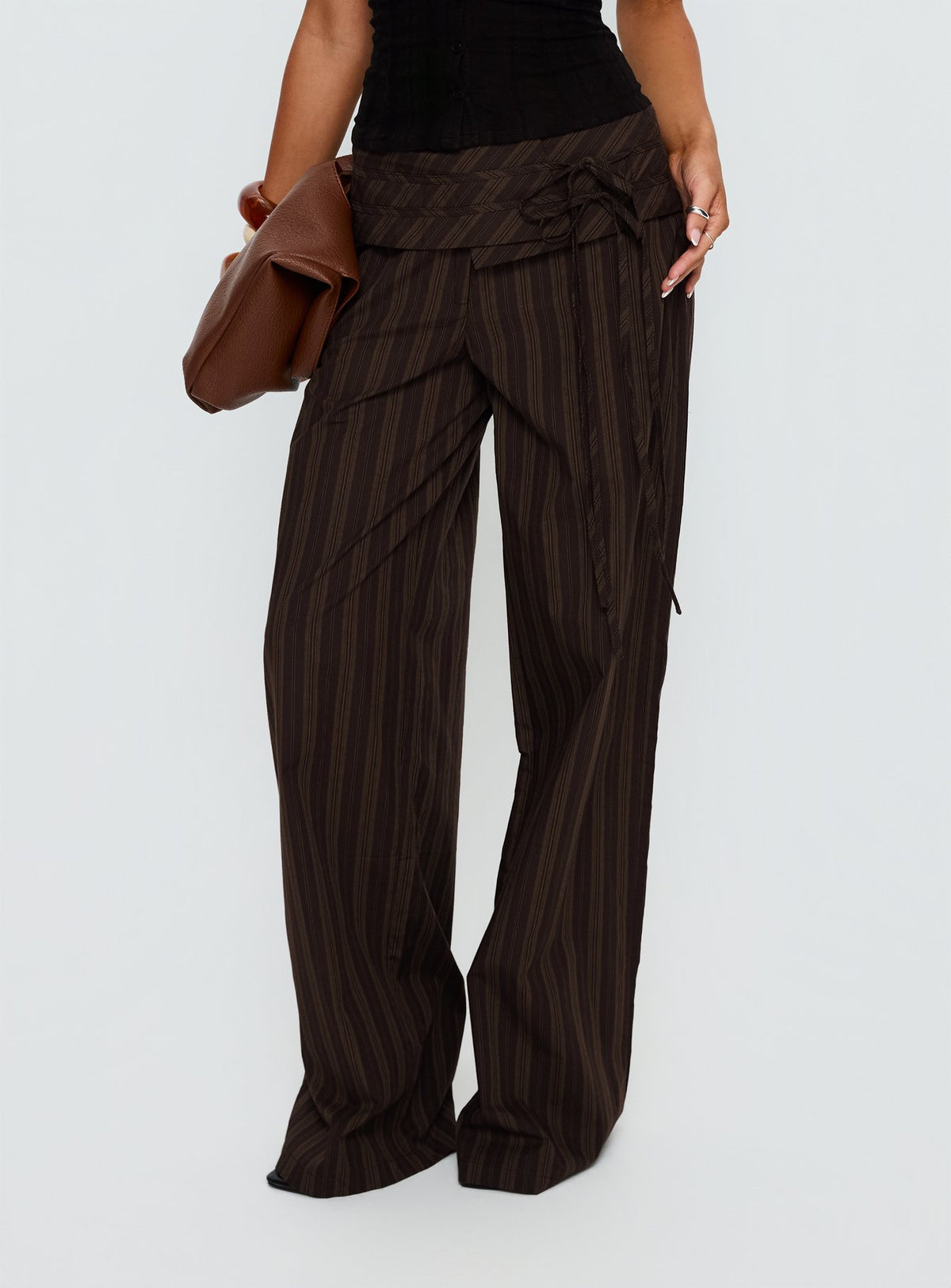 back view of model wearing Princess Polly Seneca Wrap Pant Brown Stripe Mid Rise Pants Pants 