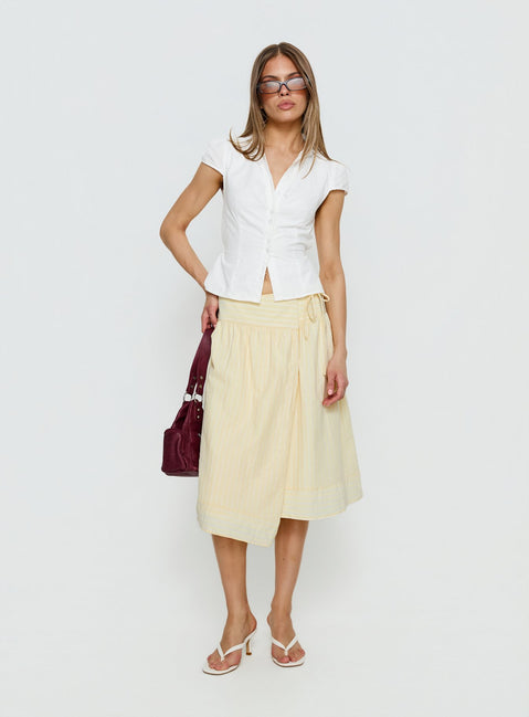   side view of model wearing Princess Polly Sunney Wrap Midi Skirt Yellow Midi Skirts Skirts 