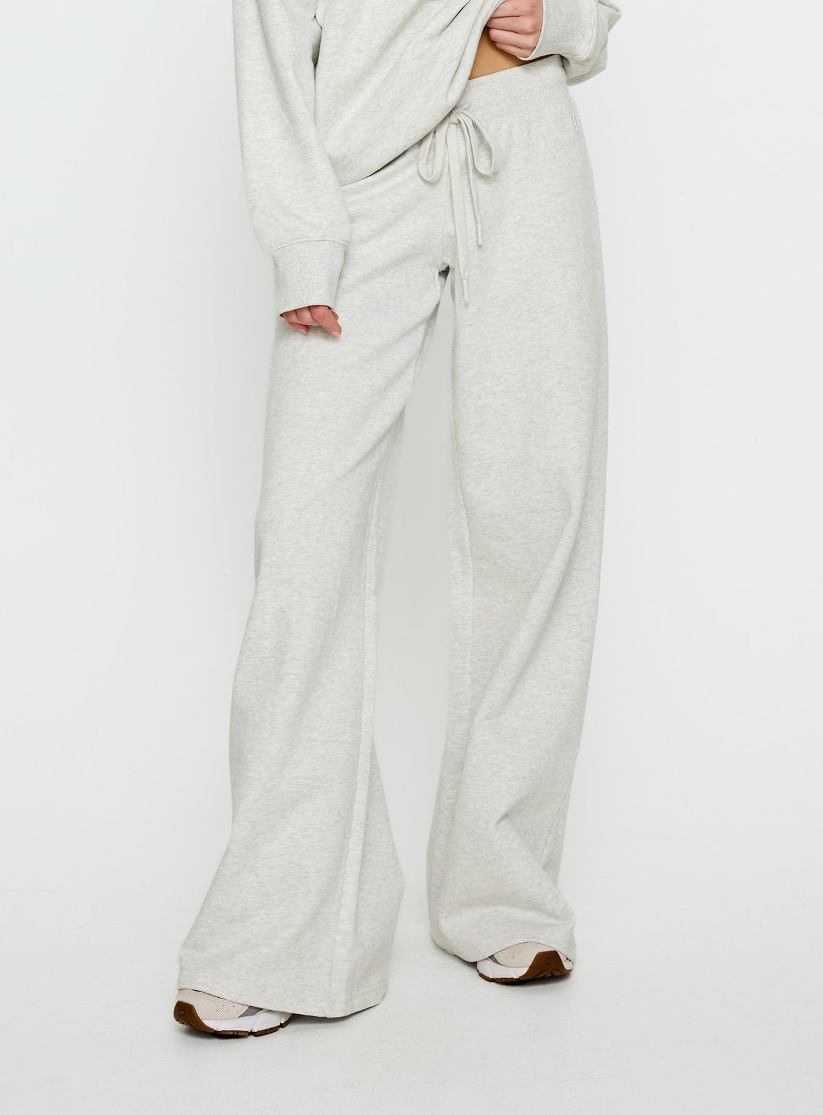 back view of model wearing Princess Polly Dodie Wide Leg Pants Grey Marle Mid Rise Pants Pants 