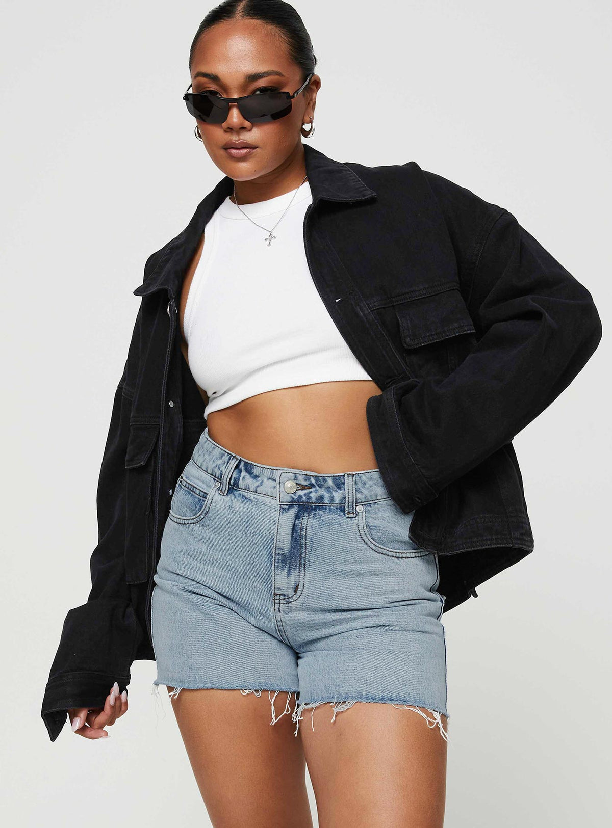 front view of model wearing Princess Polly Laurena Denim Shorts High Waisted Shorts 