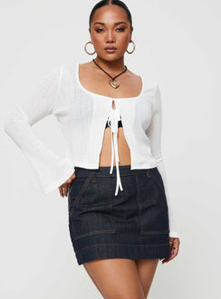   front view of model wearing Princess Polly Hughes Mini Skirt Dark Wash Denim Petite Mini Skirts Skirts 