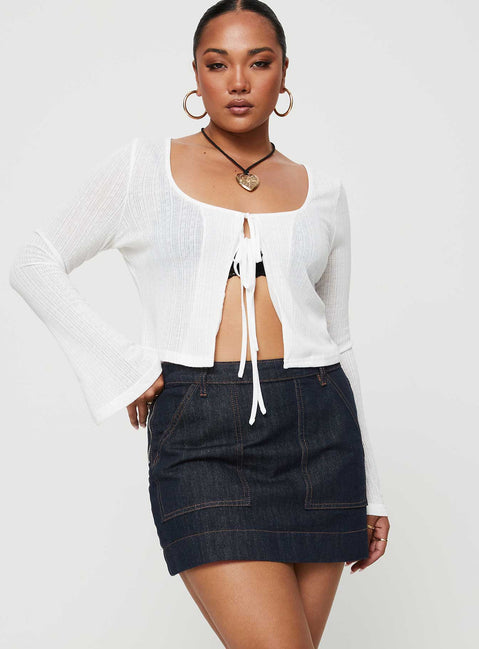   front view of model wearing Princess Polly Hughes Mini Skirt Dark Wash Denim Petite Mini Skirts Skirts 