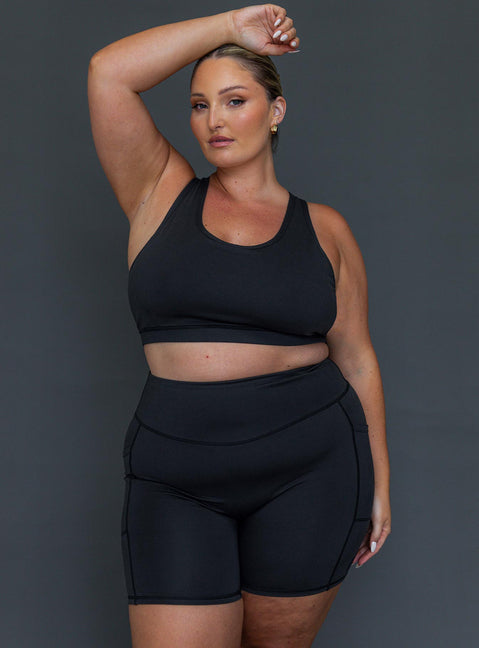 Black active shorts Featuring a high-waisted design & twin slip leg pockets