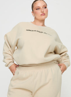 side view of model wearing Princess Polly Princess Polly Crew Neck Sweatshirt Block / Cursive Text Stone Curve regular Jumpers 