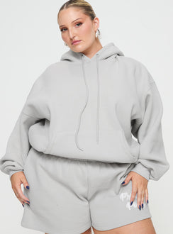 front view of model wearing Princess Polly Princess Polly Hooded Sweatshirt Puff Text Grey Curve Jumpers 