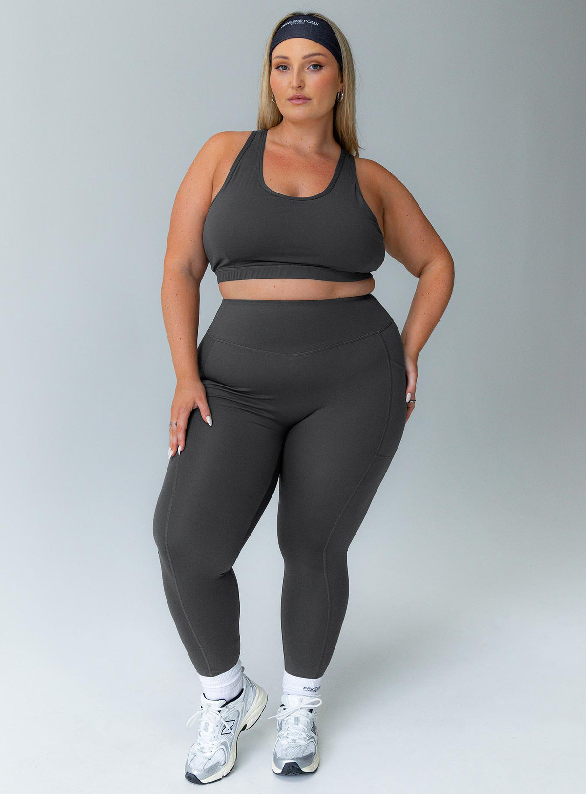 Grey leggings Featuring a high waisted design & twin slip leg pockets