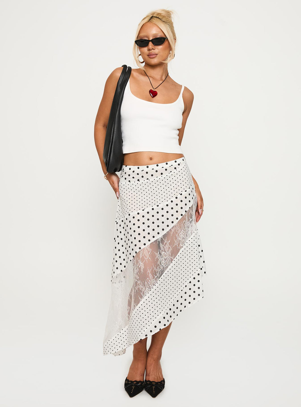   side view of model wearing Princess Polly Rennar Maxi Skirt White / Polka Dot Midi Skirts Skirts 