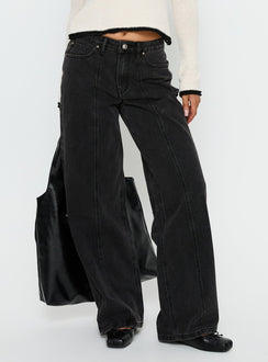 side view of model wearing Princess Polly Lando Low Rise Straight Leg Jeans Washed Black Low Rise Jeans Jeans 
