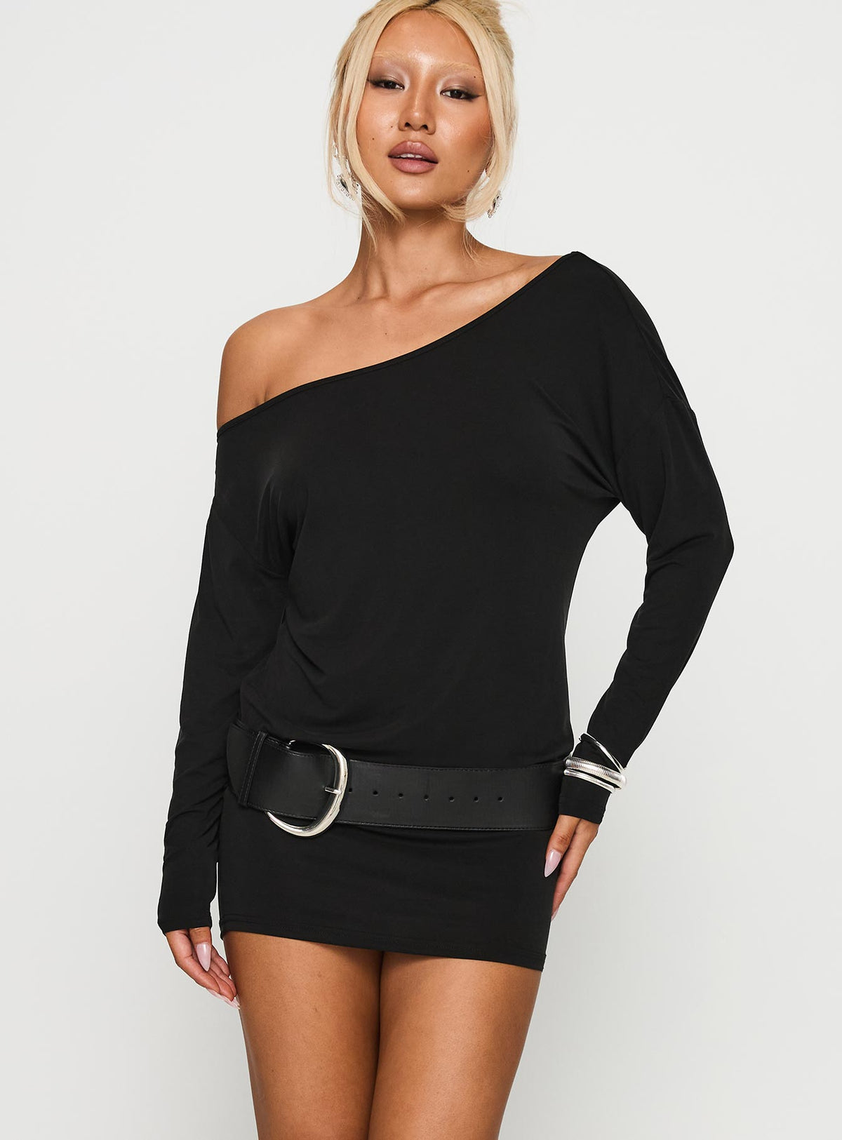 front view of model wearing Princess Polly Shelisa Mini Dress Black Asymmetric Neckline 