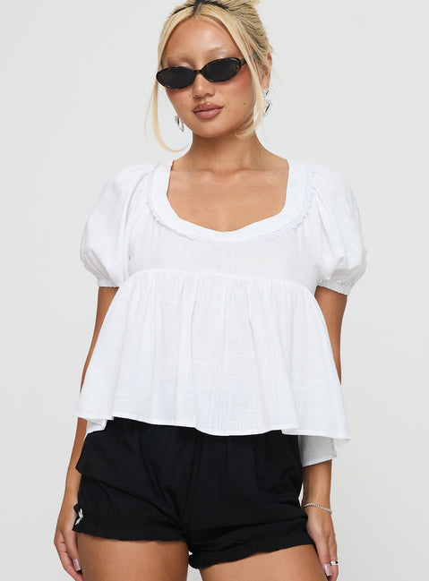 front view of model wearing Princess Polly Weyes Smock Top White Short Sleeves Scoop Neck 