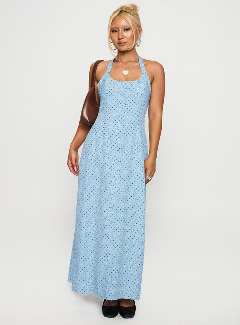 side view of model wearing Princess Polly Mallorie Halter Maxi Dress Blue / Black Polka Scoop Neck 