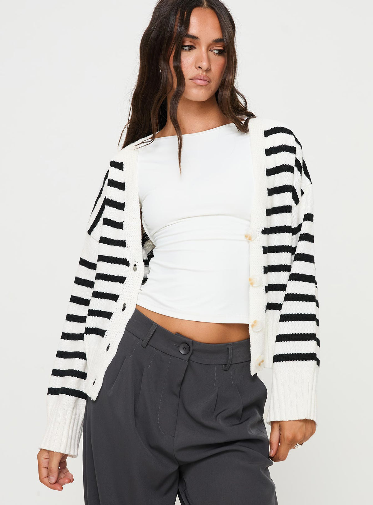back view of model wearing Princess Polly Karlson Striped Cardigan Cream / Black cropped Jumpers 