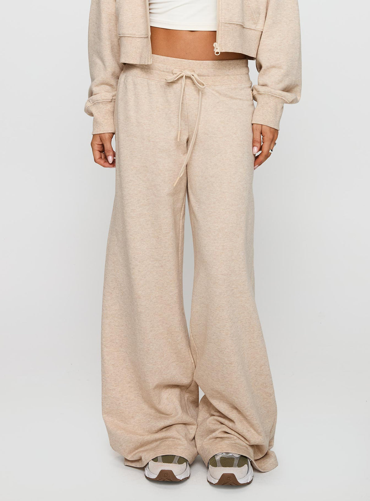 side view of model wearing Princess Polly Mindful Low Rise Pant Oat Marle Pants 