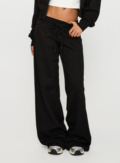 front view of model wearing Princess Polly Mindful Low Rise Pant Black Low Rise Pants Pants 