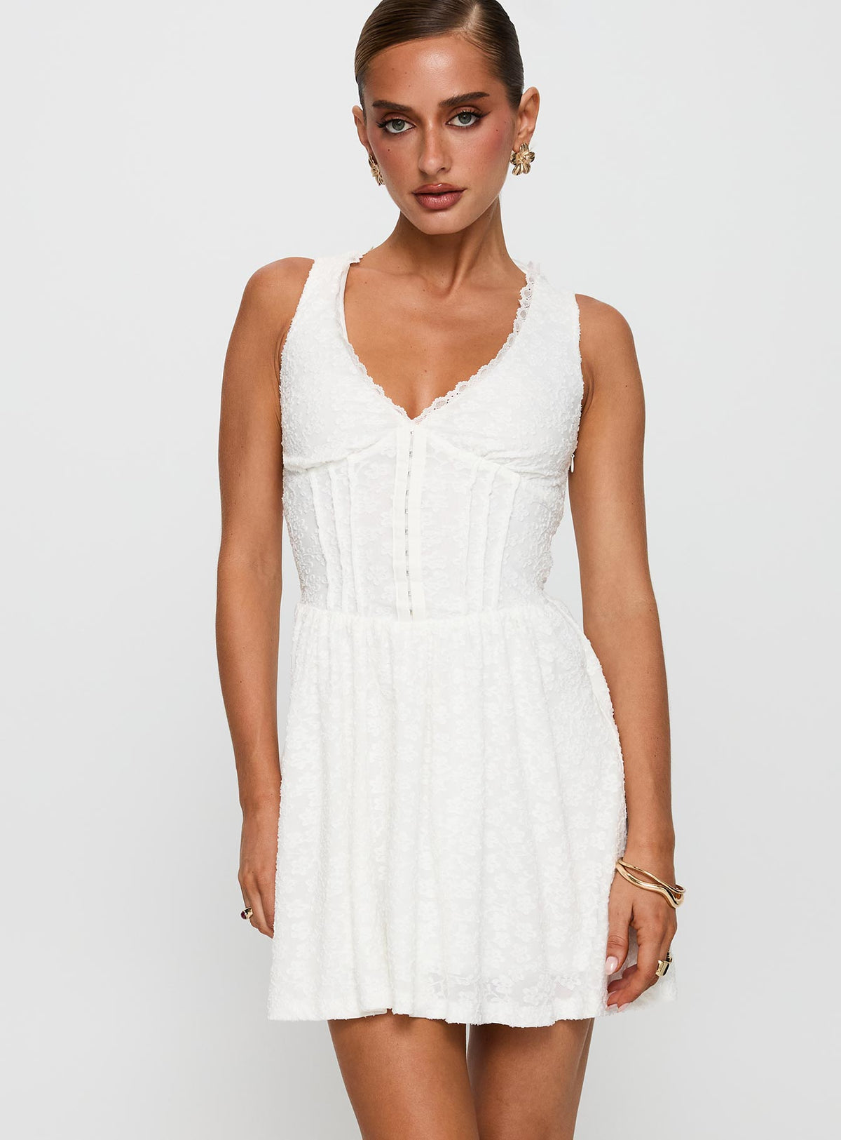 side view of model wearing Princess Polly Loveluck Lace Mini Dress White V-Neck 
