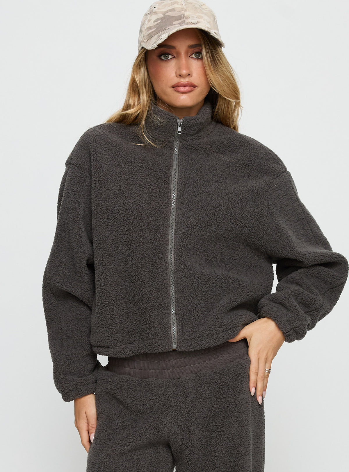 front view of model wearing Princess Polly Siberia Fleece Zip Up Jumper Charcoal regular Jumpers 