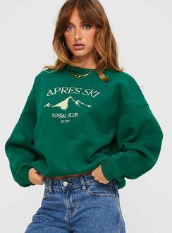 front view of model wearing Princess Polly Apres Ski Crew Neck Sweatshirt Green / Cream Jumpers 