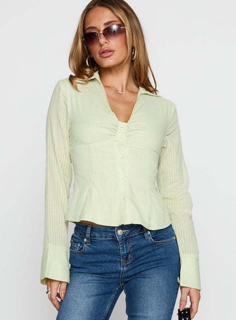 front view of model wearing Princess Polly Elowenn Long Sleeve Top Green Full Sleeves V-Neck 