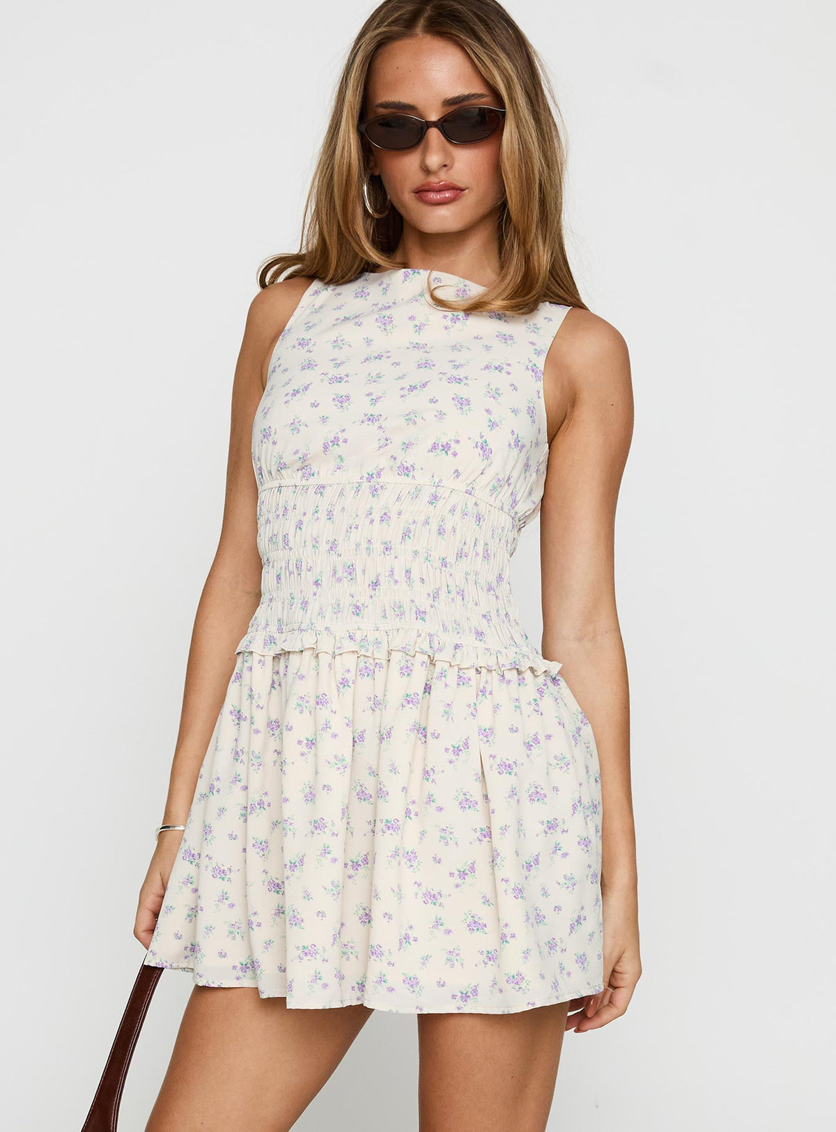 side view of model wearing Princess Polly Yennifer Shirred Mini Dress Floral Multi High Neck 