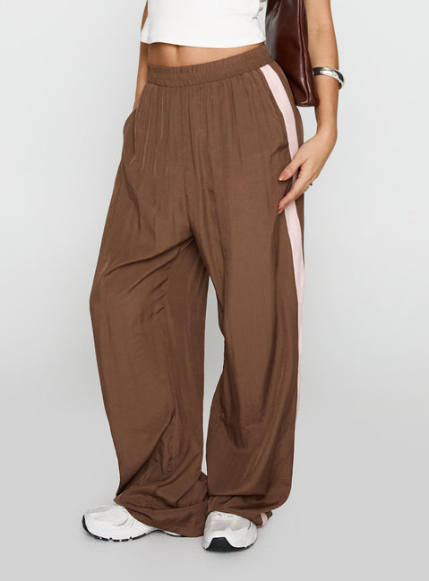 side view of model wearing Princess Polly No Doubts Track Pant Brown High Rise Pants Pants 